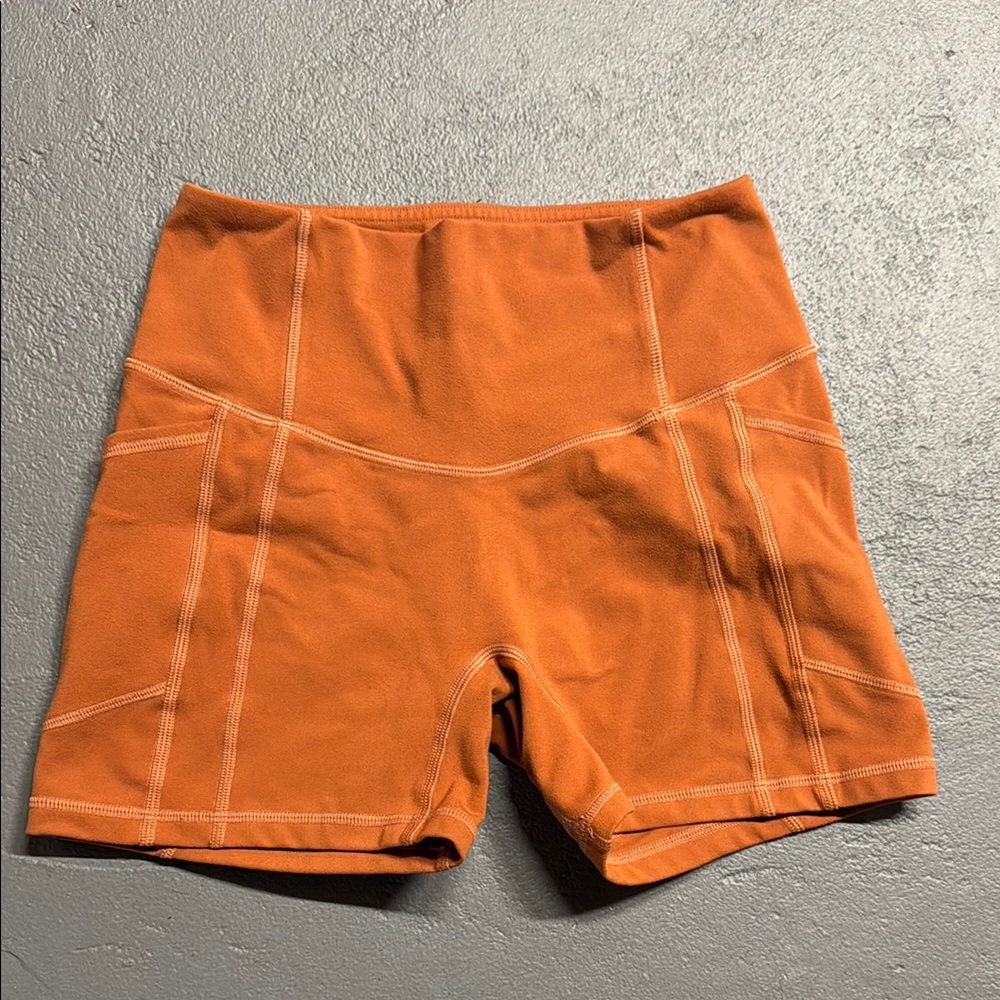Til You Collapse orange heart booty shorts